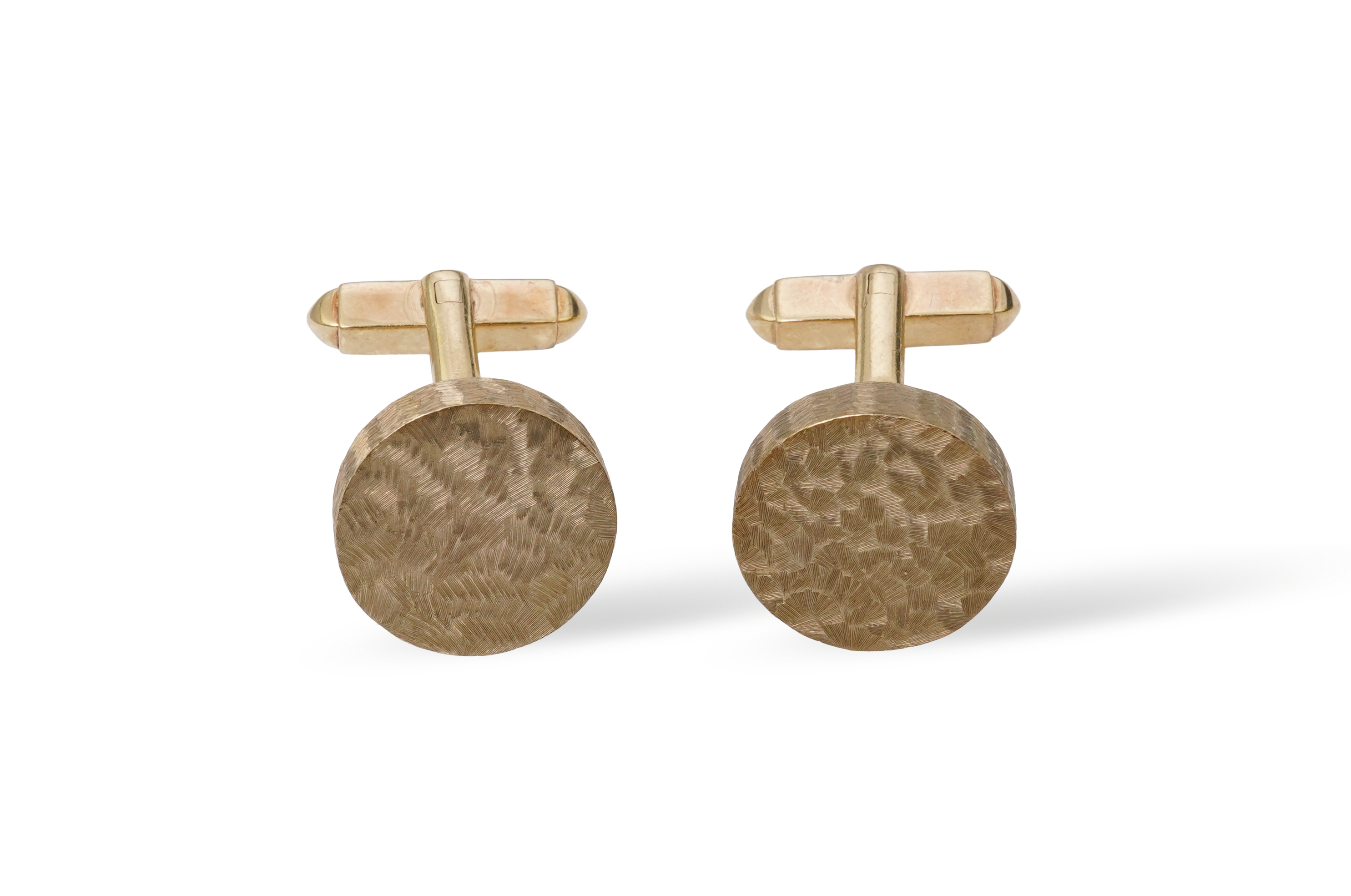 A pair of gold cufflinks, circa 1964